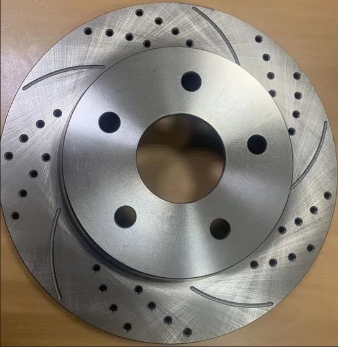 Диск тормозной задний RAM 1500 03+